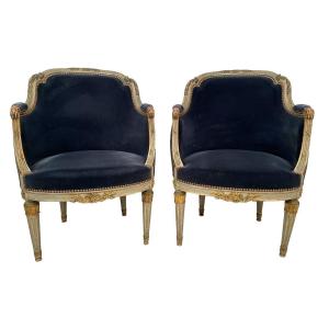 Pair Of Louis XVI Style Bergeres In Gray Lacquered Wood And Gold Rechampi, Late 19th Century