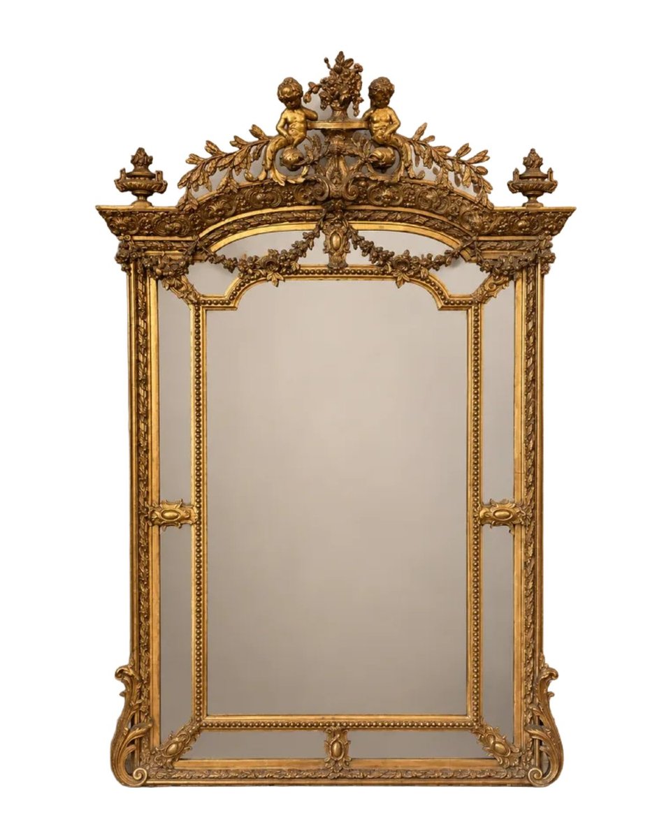 Grand miroir à parecloses en bois et stuc doré, style Louis XVI, XIXe siècle