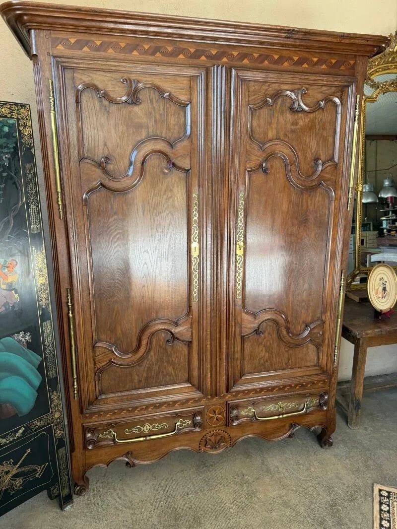 Armoire de mariage lorraine en chêne sculpté et marqueté, XIXe siècle