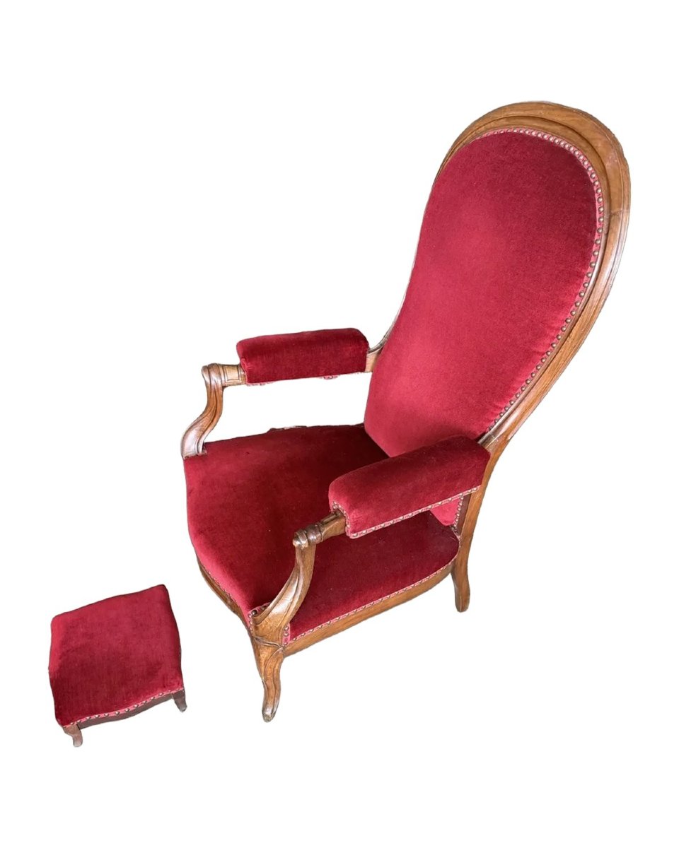Fauteuil Voltaire en noyer à dossier inclinable, avec repose-pieds, XIXe siècle