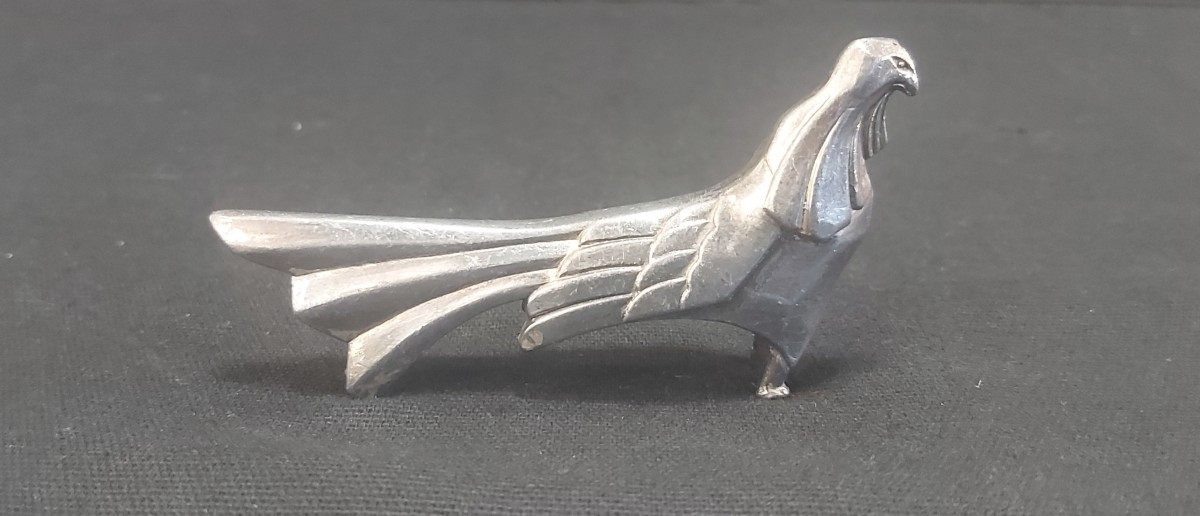 12 porte-couteaux animaliers en métal chromé inspirés de E. M. SANDOZ.