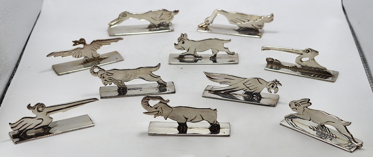 Benjamin Rabier, suite de 10 porte-couteaux zoomorphes en métal argenté, XXe