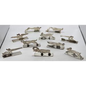Benjamin Rabier, suite de 10 porte-couteaux zoomorphes en métal argenté, XXe