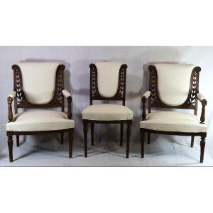 Ensemble de deux fauteuils et une chaises de style Louis XVI, XIXe