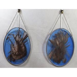 Paire de médaillons, vitraux " Attributs de chasse ", fin XIXe