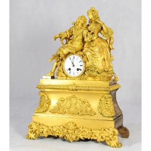 Pendule bronze doré " Louis XIV et une courtisane", XIXe