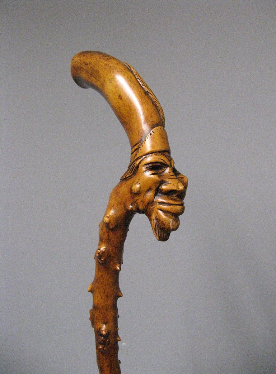Monoxyl Cane In Boxwood Carved With Grotesque Head Of Voodoo Sorcerer. 19th Century Popular Art.