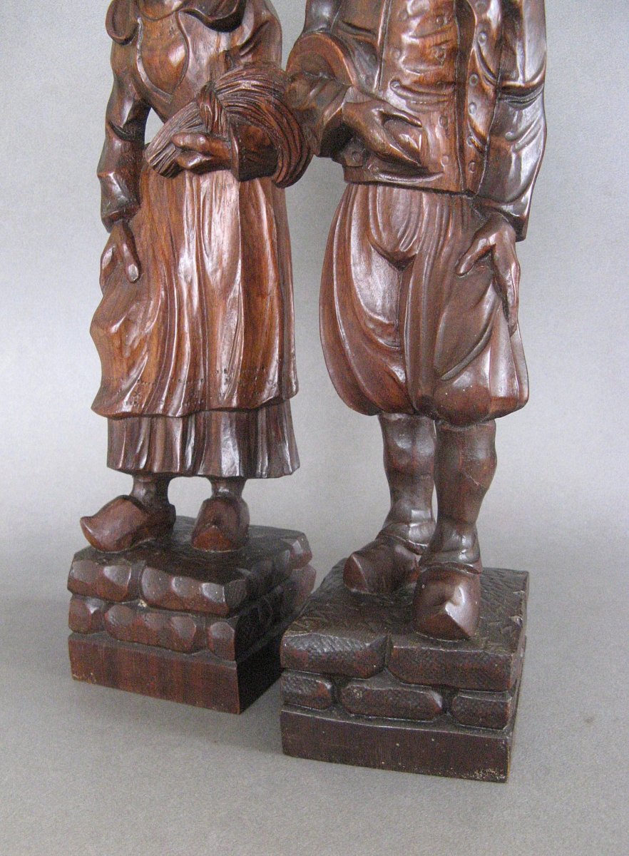 A Breton Couple In Carved Wooden Costumes.-photo-4