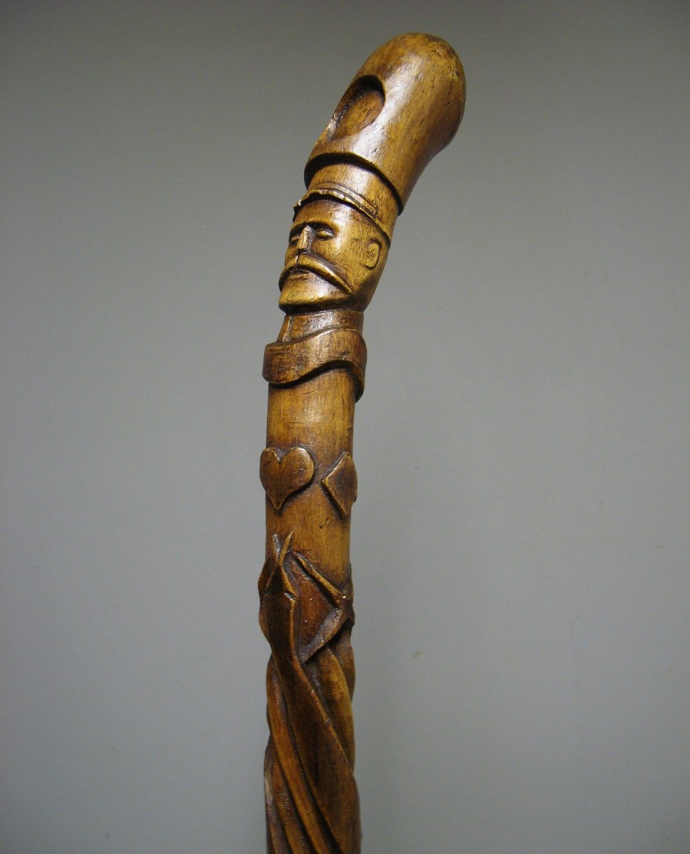 Folk Art Cane In Carved Wood.