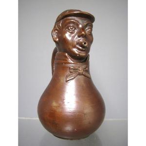 Pitcher In Glazed Stoneware With Jockey Head. Absinthe.