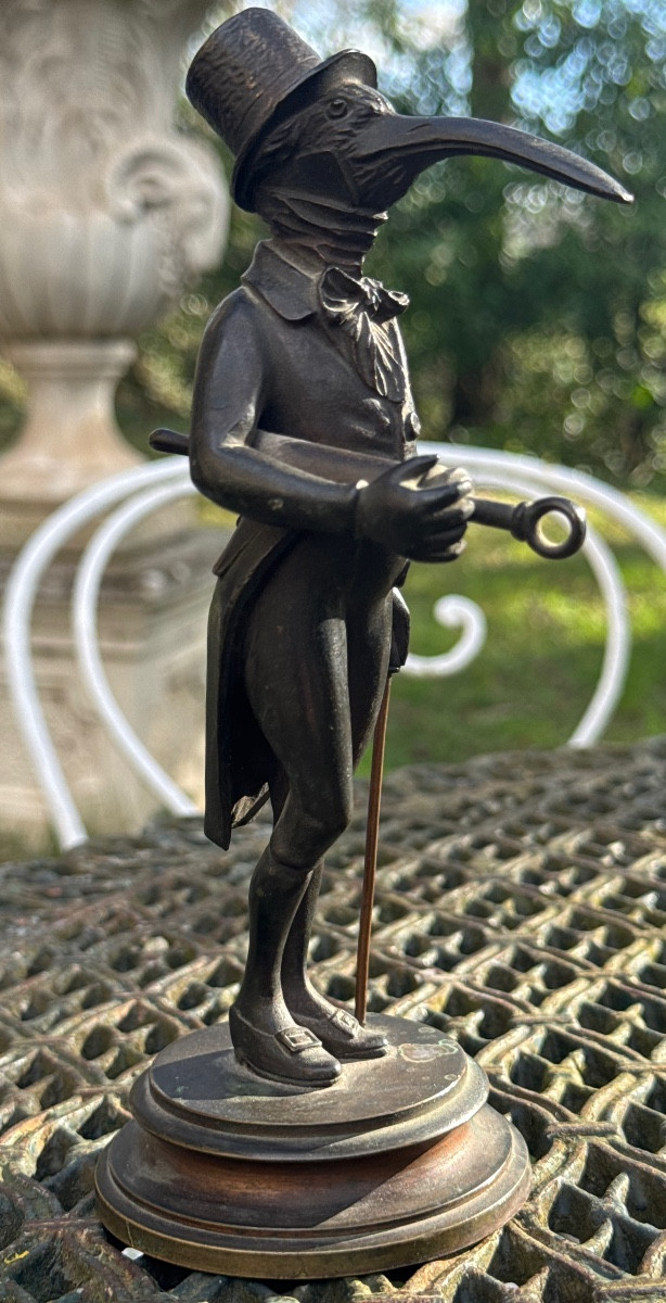 Caricature d’un Médecin à tête d’oiseau et au clystère