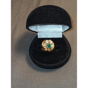 18 K Yellow Gold Ring In Dome Shape Adorned With Brilliants And An Emerald Circa 1940