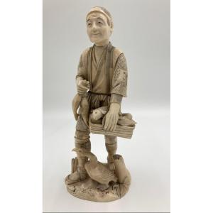 Japanese Okimono Of A Fishmonger (1868-1912)