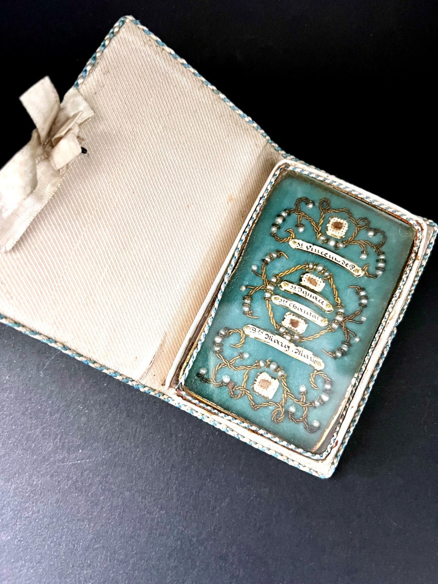 Reliquary In The Form Of An Embroidered Booklet, Containing 4 Relics 
