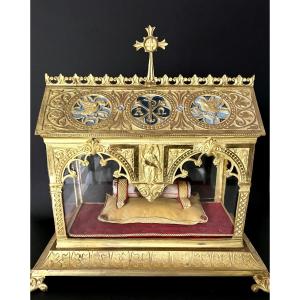 Chasse reliquaire néogothique en bronze doré contenant un tube reliquaire ex ossibus – XIXe 
