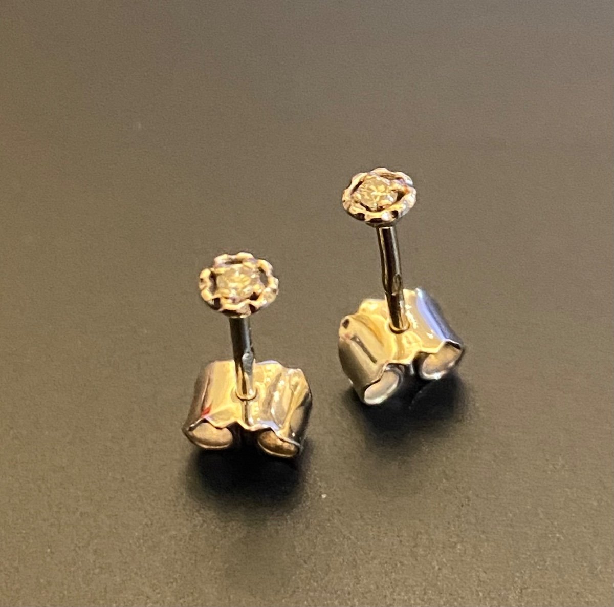 Pair Of Gold And Diamond Stud Earrings-photo-3
