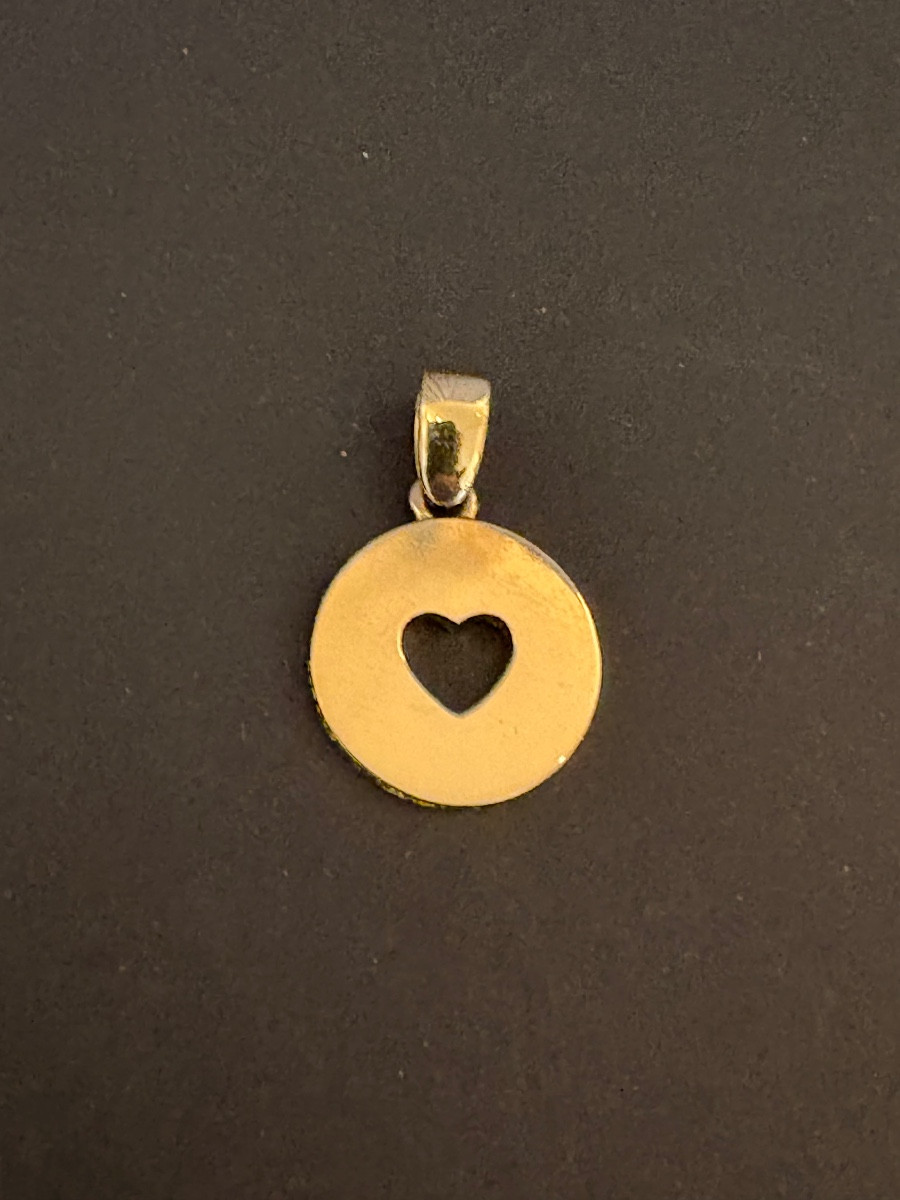 CARTIER: pendentif en or jaune 750/1000 eme. Signe.