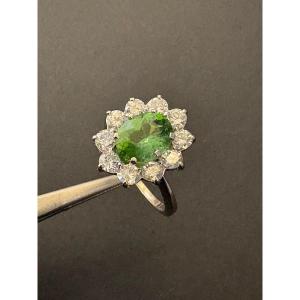 Bague en or gris 750/1000 eme, tourmaline paraiba et diamants.