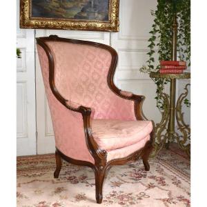Bergère à haut et large dossier dite en confessionnal de style Louis XV , XIXe