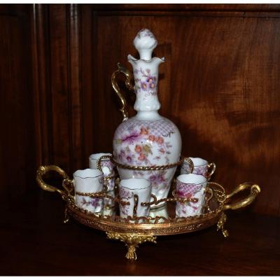 Liqueur Service In Limoges Porcelain On Tray With Mirror Bottom, Bronze And Gilded Brass.