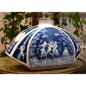 Marcel  Chaufriasse , Grand Vase Soliflore En Porcelaine De Limoges, Décor De Faunes, Satyres Et Ménades, en pâte sur pâte.