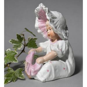 German Baby Piano; Heubach Biscuit Doll, Germany, 19th Century; Sock, 1900, Baptism