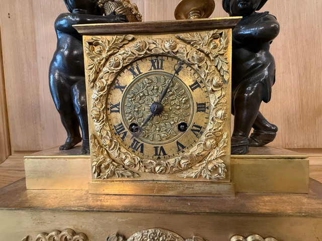 Gilded Bronze Clock With Children Playing In Brown Patina From The Restoration Period.-photo-1