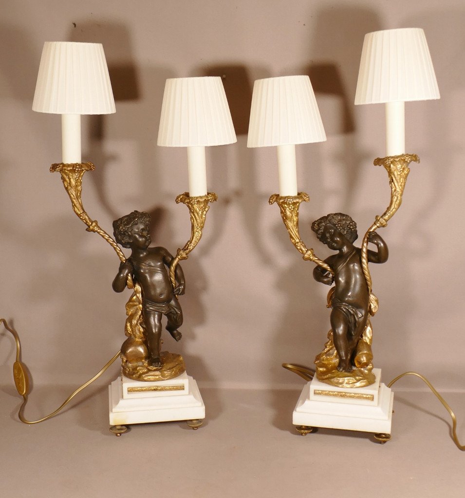 Clodion, Pair Of Putti Candlestick Lamps In Patinated And Gilded Bronze, 19th Century