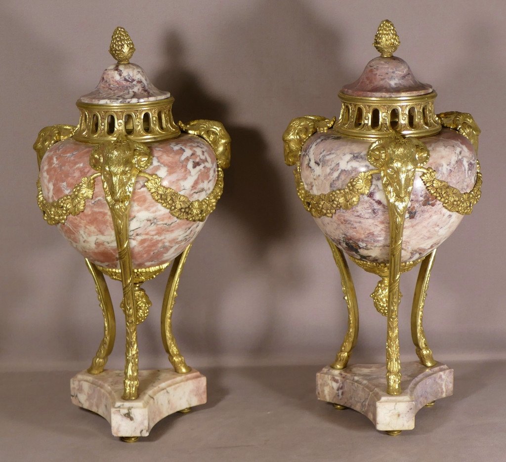 Pair Of Louis XVI Cassolettes In Veined Pink Marble And Gilt Bronze With Rams, 19th Century
