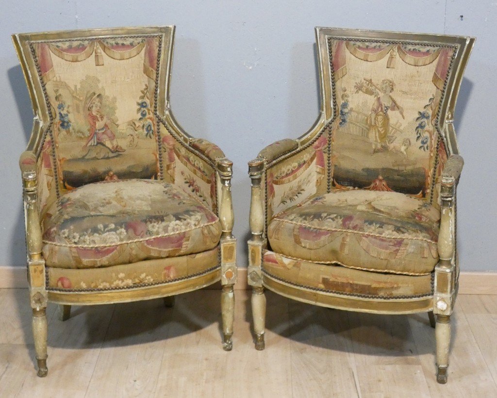 Paire de bergères en bois laqué et doré tapisseries  pastorales - Epoque Directoire, vers 1795
