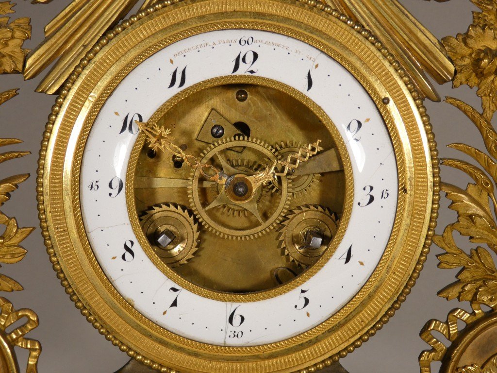 Rare pendule squelette au soleil en bronze doré, signée Deverberie à Paris – Époque Consulat-photo-3