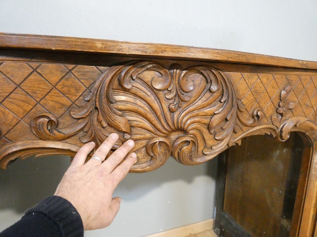 Important manteau de cheminée en chêne sculpté, de style Régence – XIXe siècle-photo-2