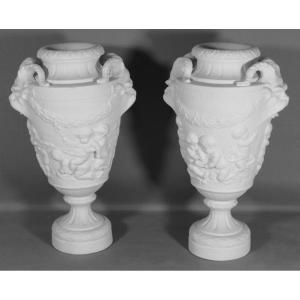 Clodion, Pair Of Cassolette Vases With Putti In Biscuit Porcelain, Early 20th Century