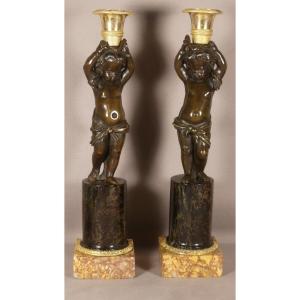 Pair Of Louis XVI Candlesticks With Putti In Patinated Bronze, Gilt And Marble, 18th Century 