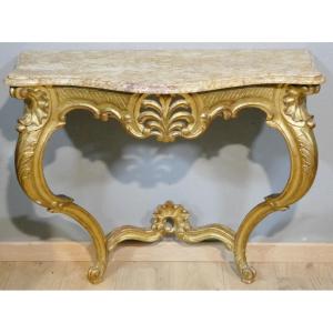 Console de style Louis XV en bois sculpté doré, époque début XX ème