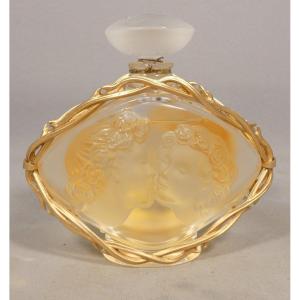 Lalique – “le Baiser” Perfume Bottle In Crystal And Gold-plated Metal