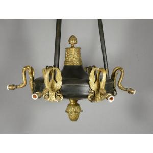 Grand lustre de style Empire en bronze doré et tôle patinée à décor de cygnes – Vers 1900