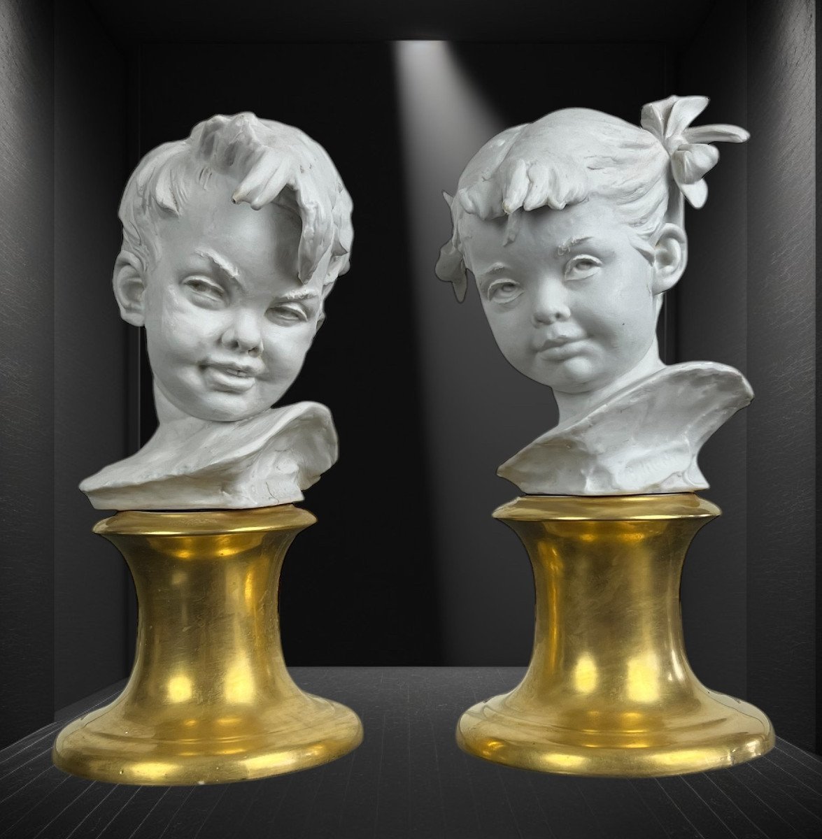 Pair Of Biscuit Child Busts Signed Bruno Merli On Porcelain Base