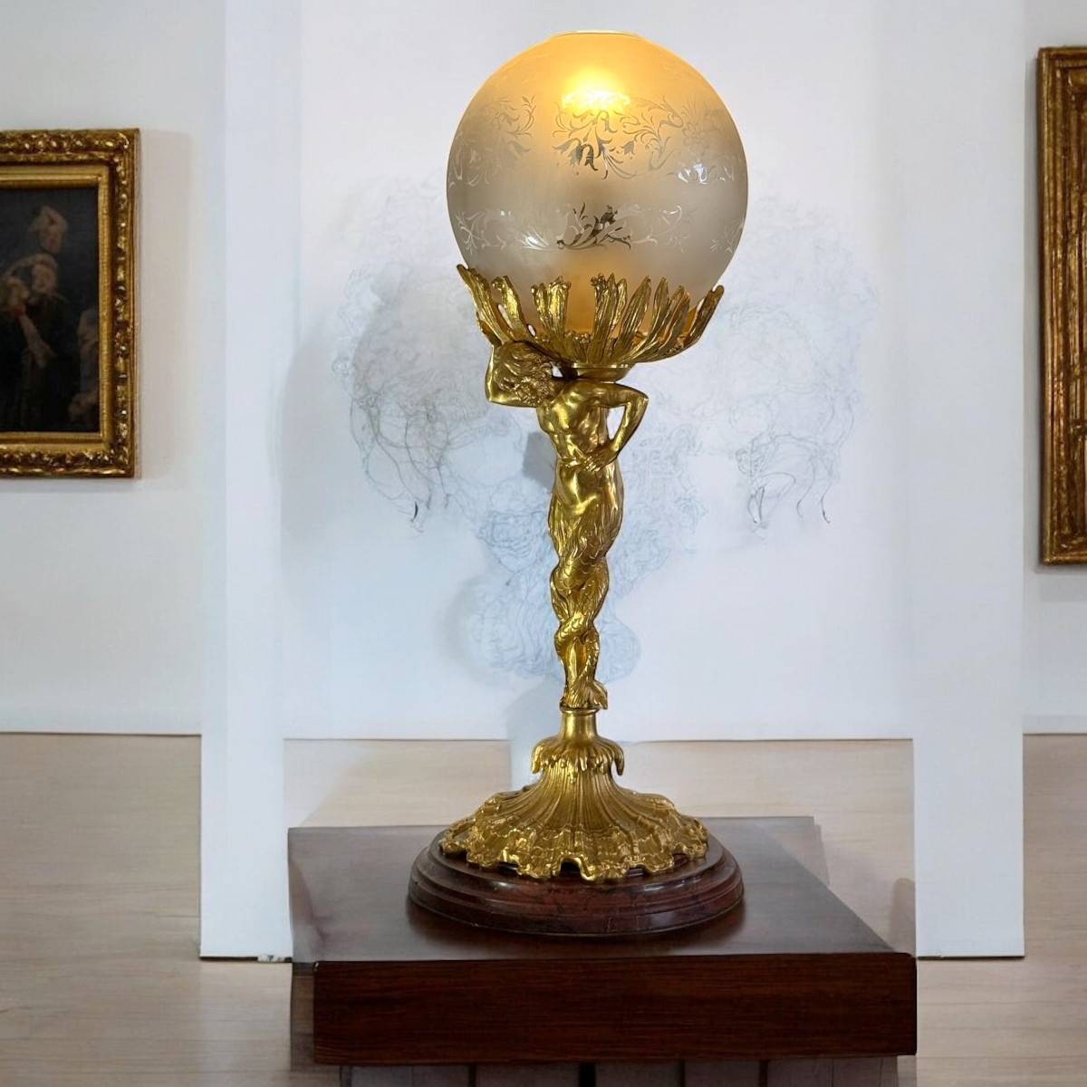 LAMPE XIXe EN BRONZE DORÉ REPRÉSENTANT UN TRITON A DOUBLE QUEUES SOCLE MARBRE