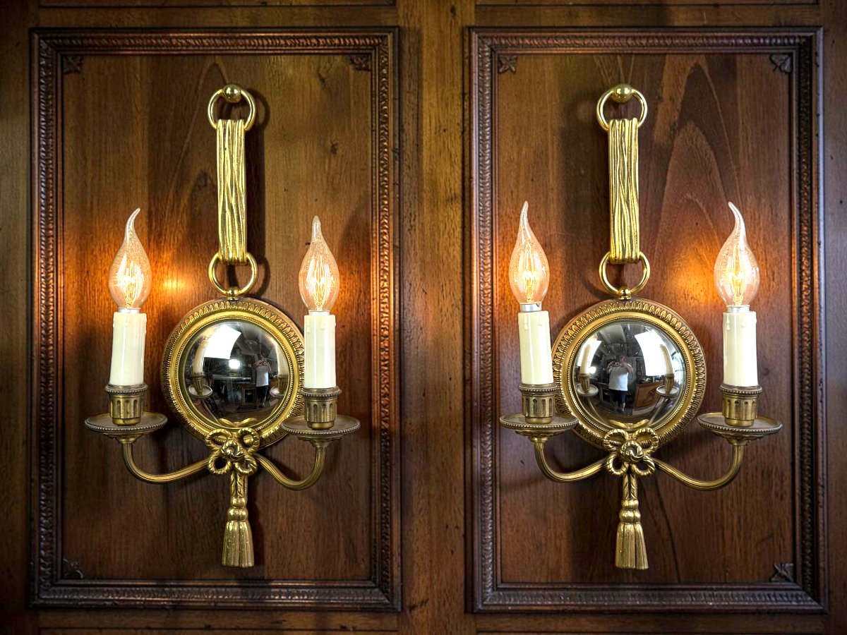 PAIRE D'APPLIQUES  EN BRONZE DORÉ AVEC MIROIR CONVEXE SIGNÉE PETITOT DES ANNÉES 30