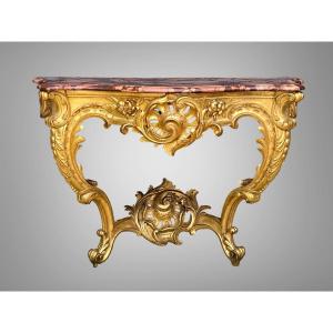 Console époque XIXe En Bois Doré Et Sculpté Avec Un Dessus Marbre Rouge Veiné