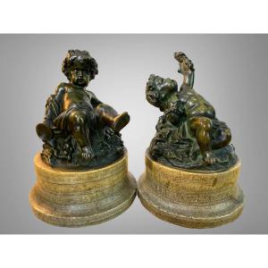 Pair Of Putti In Patinated Bronze Resting On Marble Pedestals Period 18/19th