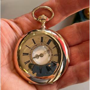 Montre demi-savonnette en or.XIXè