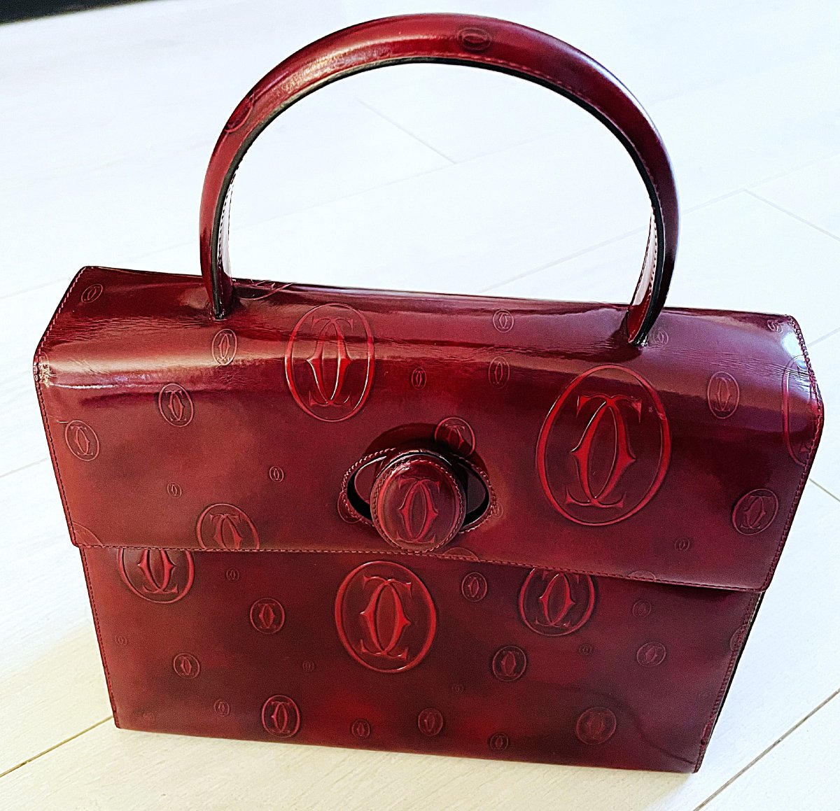 SAC CARTIER " HAPPY BIRTHDAY " -CUIR GLACE BORDEAU - EMBOSSE ALL-OVER- XX°