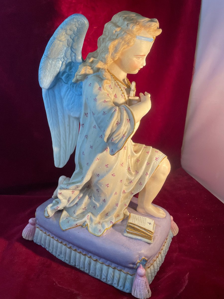 Praying Angel Kneels With A Cross-photo-3