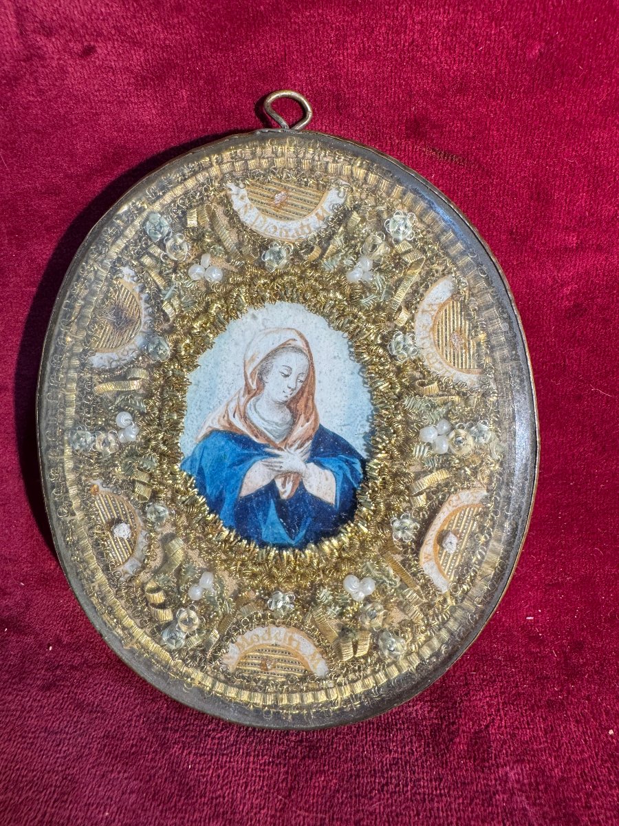 RELIQUAIRE DANS UN MEDAILLON OVALE SAINTE VIERGE ST JOSEPH