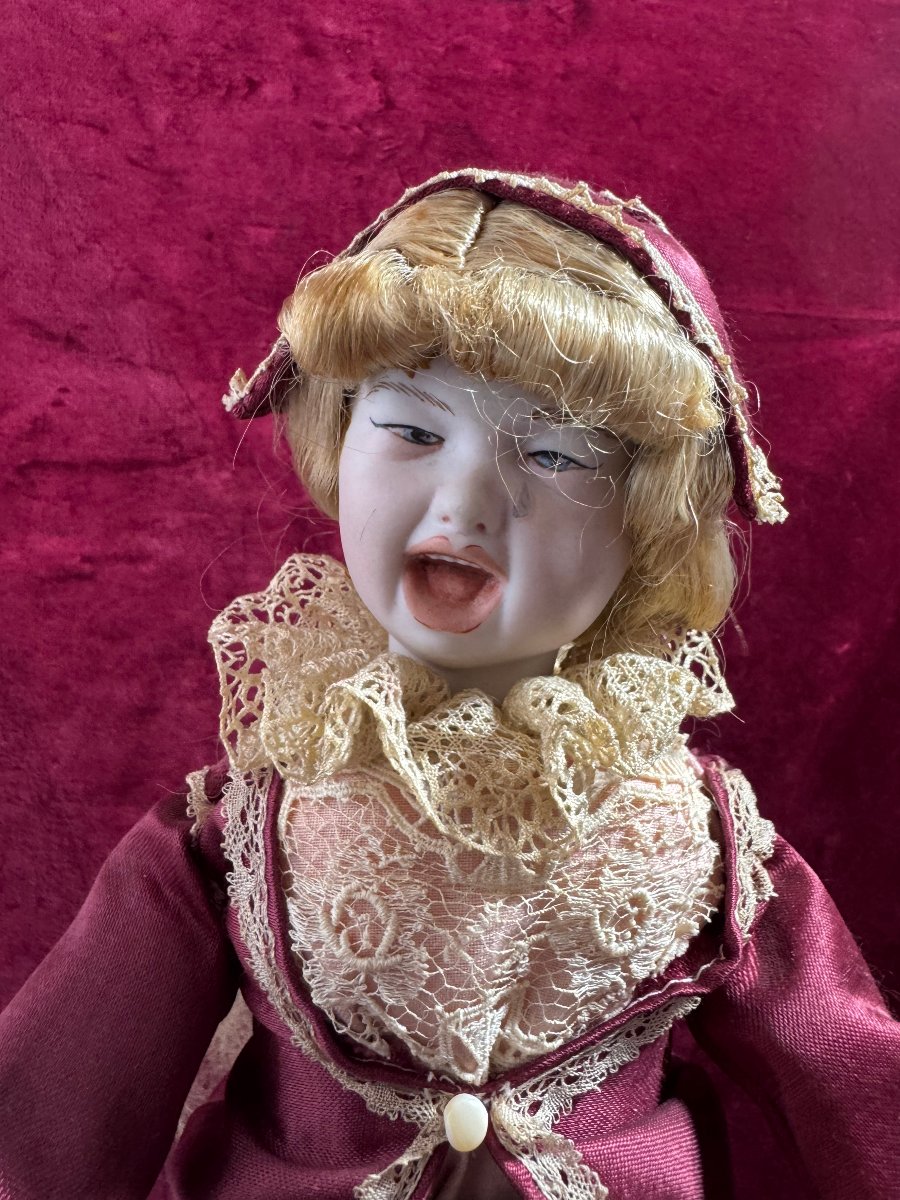 Robot Of A Young Girl Correcting Her Doll-photo-3