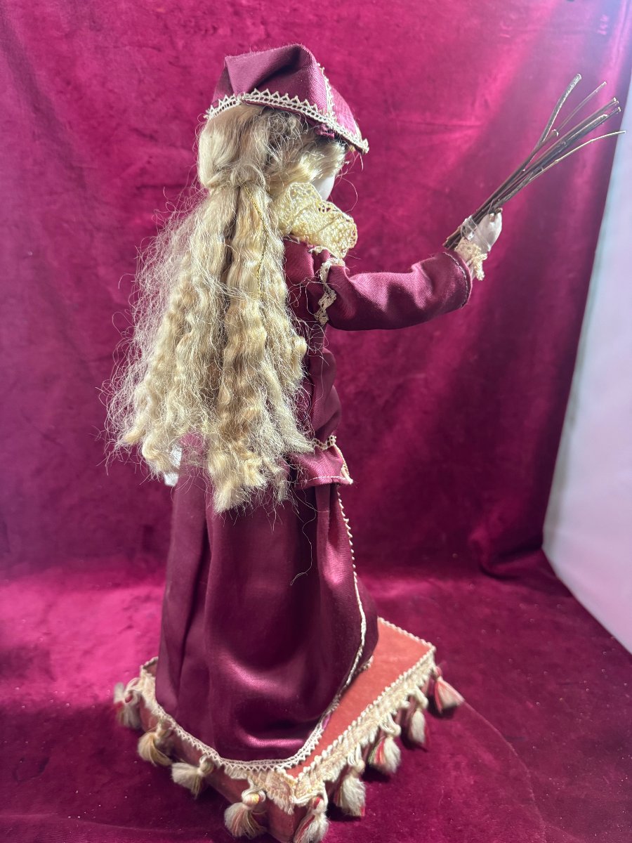 Robot Of A Young Girl Correcting Her Doll-photo-5