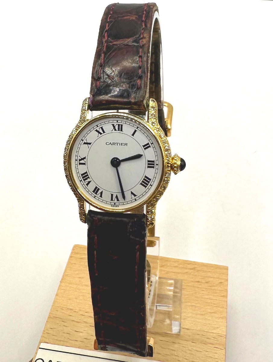 Montre CARTIER en or et diamants