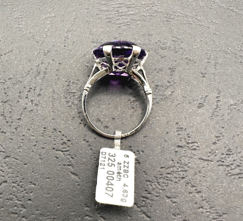 White Gold Ring With A Round Amethyst-photo-1